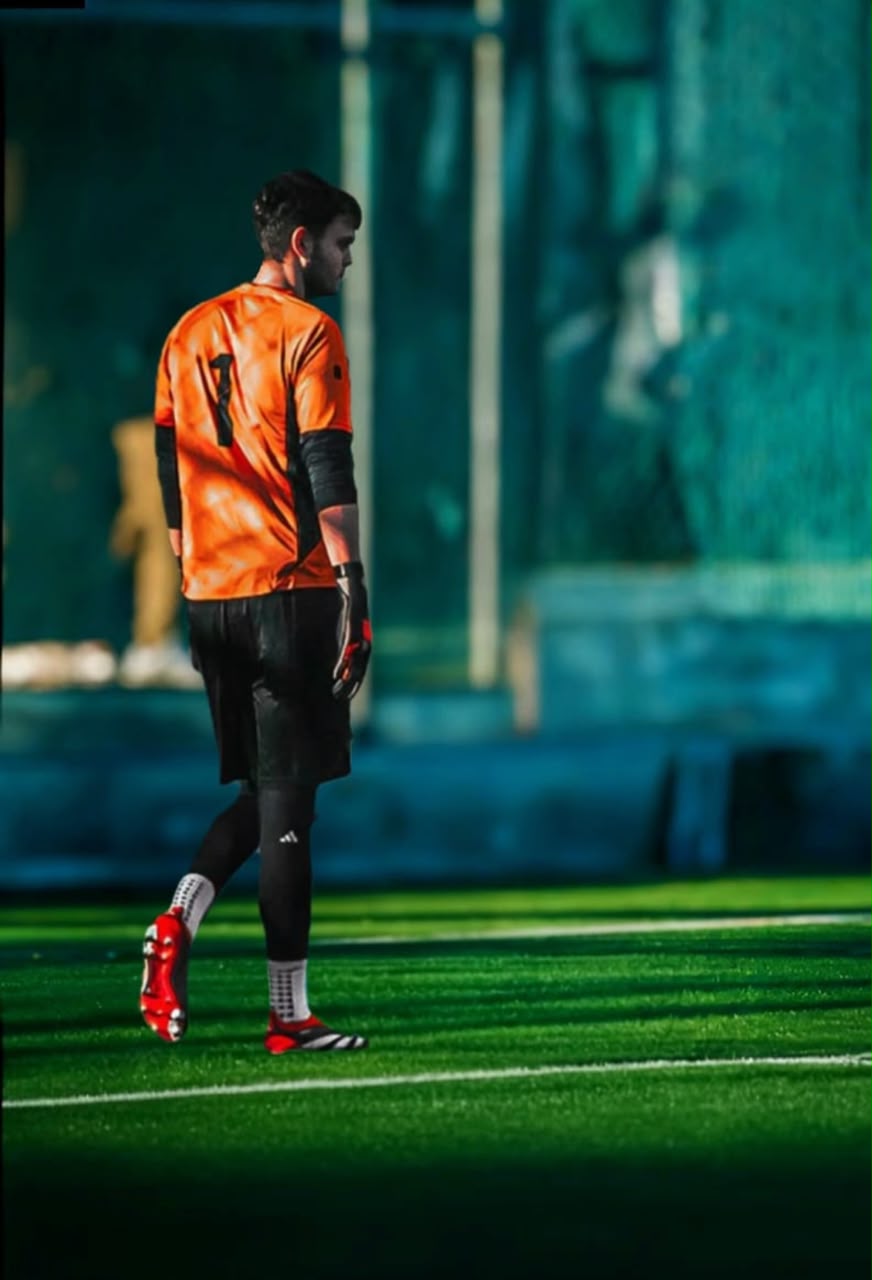 Andreas Paterakis on the football pitch in goalkeeper kit